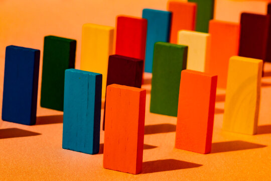 Close-up of rectangular blocks in a line on orange background