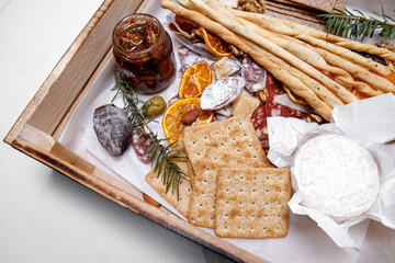 Catering. Snacks and goodies. Scrap delivery set. Jam, biscuits, sausage, cheese, orange and more