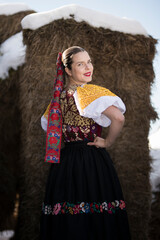 Young beautiful slovak woman in traditional dress. Slovak folklore