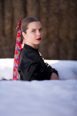 Young beautiful slovak woman in traditional dress. Slovak folklore