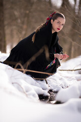 Young beautiful slovak woman in traditional dress. Slovak folklore