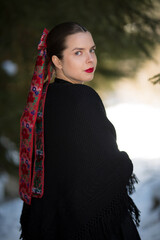 Young beautiful slovak woman in traditional dress. Slovak folklore