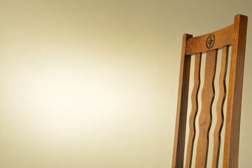 zoom in Backrest of a  antique oak chair. wall is bright. 

This expensive furniture is made in...