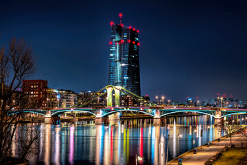 View to the Europäische Zentralbank (EZB ) at night with illuminated bridges in Frankfurt am Main,...