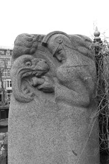 Amsterdam Street Sculpture of a Fireman and a Dragon on a Bridge in Black and White