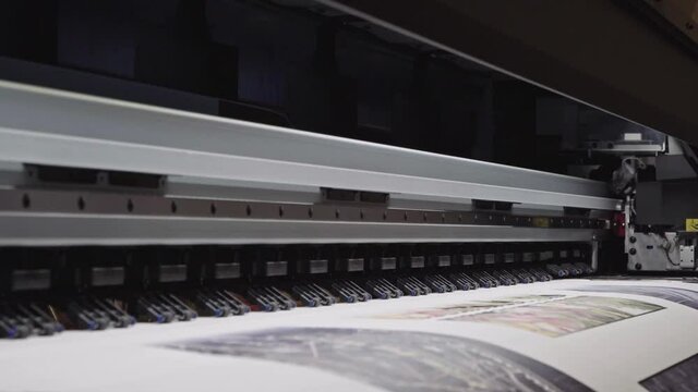 Large format high speed industrial printer for printing promotional products