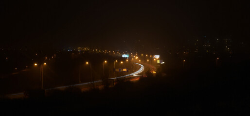 Night city, blurred traffic, light lines