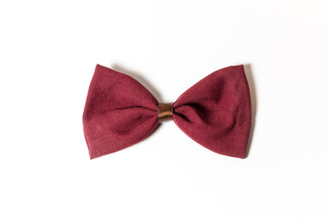 Red wine purple bow ribbon over a white background