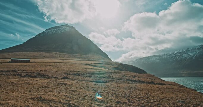 Landscape of a mountain and sea in a sunny winter day. 