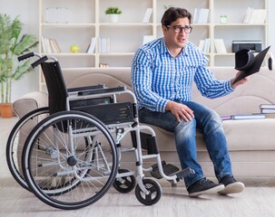 Young student on wheelchair in disability concept