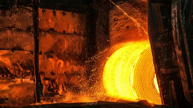 Roll of hot metal on the conveyor belt. Cinemagraph.