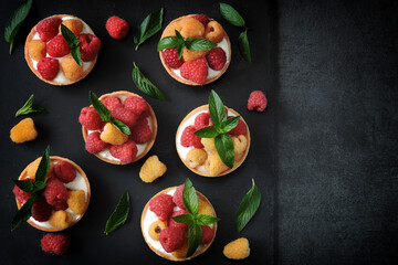 Raspberry tarts with white yogurt and fresh raspberries. Healthy dessert. Keto dessert.