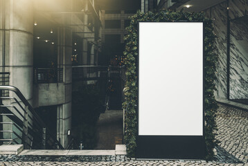 An empty poster mock-up for advertisement in a shopping center; a blank white billboard template...