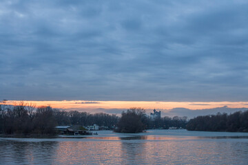 Cloudy sunset over usce, the confluence between the sava and the danube (dunav) river and the...