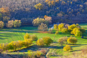 Obraz premium Panoramic green nature in the spring . Place in nature where people come for a picnic