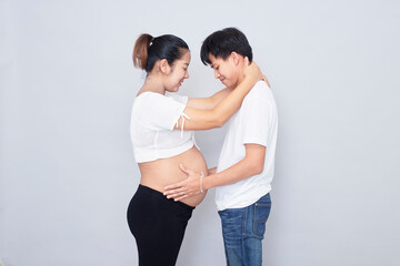 Fototapeta premium portrait of a happy pregnant wife with her husband
