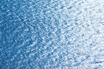 Blue tropical sea surface with waves and ripples