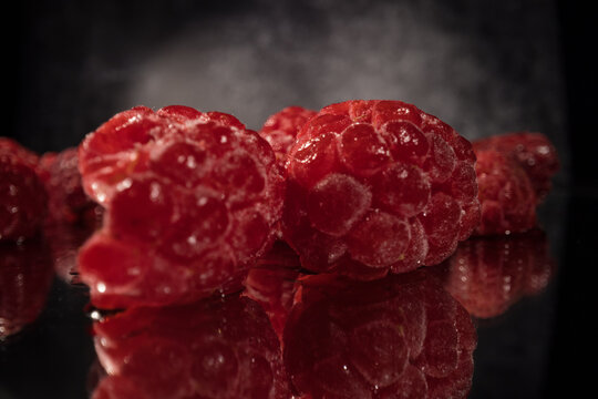 Frozen raspberries in close-up - food photography