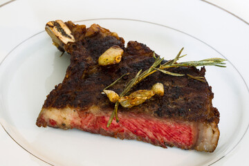 Sliced Grilled beef steak on white plate