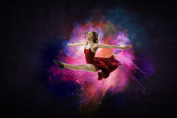 Female dancer against abstract colourful background