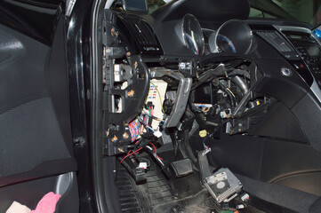 View of the electrical equipment of the car interior under the dashboard