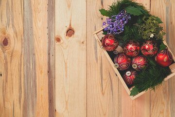 Christmas decorations and ornament on wooden background.