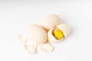 Fresh hard-boiled egg on pure white background