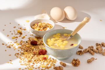 A simple nutritious breakfast on a solid color background