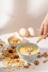 A simple nutritious breakfast on a solid color background