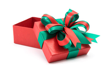 Opened red Christmas gift box with green bow and ribbon.