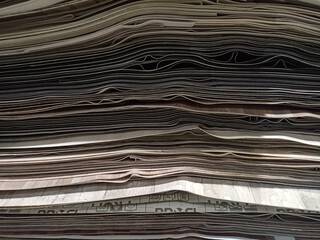 A bunch of leftover pieces of linoleum stacked on top of each other.