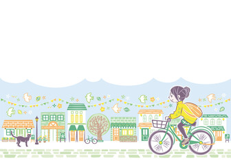 にぎやかな街並みで自転車に乗る女性