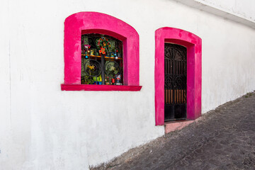 Mexico, Scenic Taxco colonial architecture and cobblestone narrow streets in historic city center near Santa Prisca church.