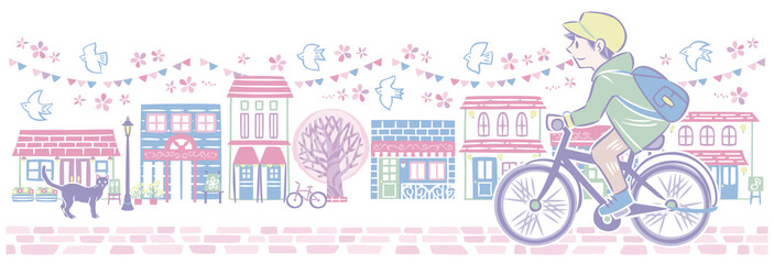 Fototapeta na wymiar 春の桜の街並みで自転車に乗る男性