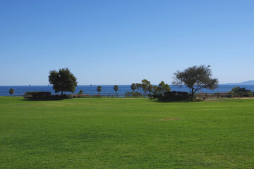Fototapeta na wymiar Panoramic view of the Pacific ocean and Santa Cruz Island seen from the Santa Barbara City College campus in southern California