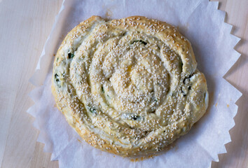 Cheese spinach pie. Salty cake recipe. Step by step. View from above. The girl is cooking. Result © Дарья Сахарова