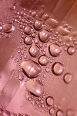 Macro shooting of water droplets beside the glass surface close up liquid drops modern background pattern high quality print