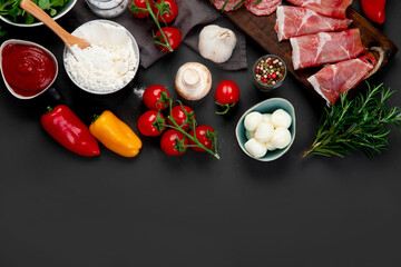 Italian pizza preparation. Variety of traditional cooking ingredients.