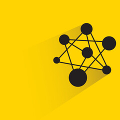 atom structure with shadow on yellow background