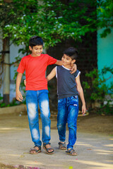 Obraz premium Indian little child walking together and showing expression
