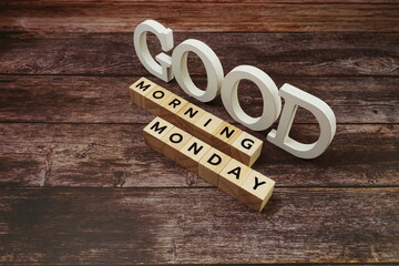 Good Morning Monday Word alphabet letters on wooden background