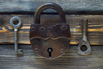 old rusty padlock and keys