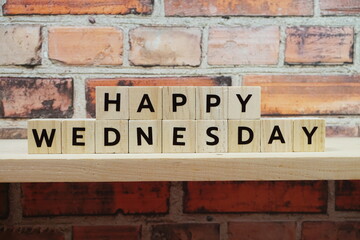 Happy Wednesday alphabet letter on shelves wooden background