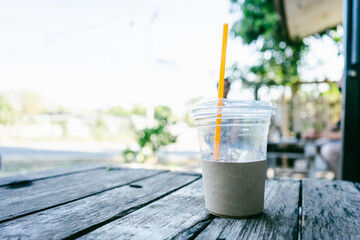 Ice coffee on wood table 