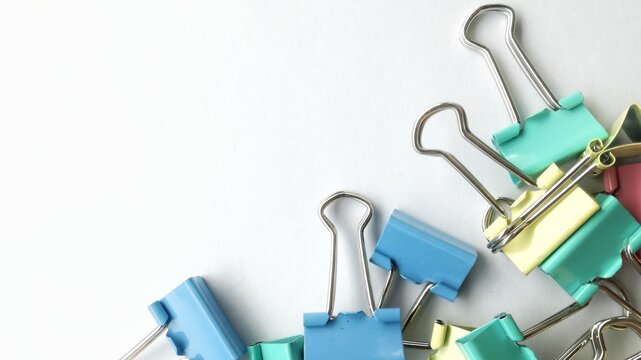 Blue Paperclip With White Background