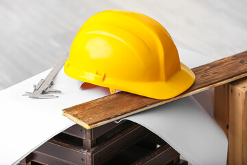 Hardhat and caliper in workshop