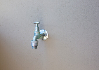 tap on a wall outside