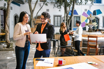 Latin people at work in a creative office in Mexico