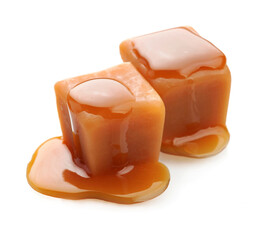 Caramel candy with caramel topping on white backgrounds.