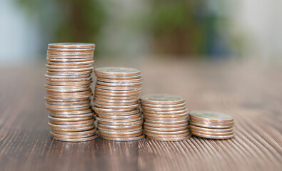 A row of diminishing dollar coins
